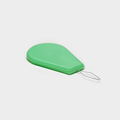 Beadsology needle threader with a bright green plastic handle and a thin wire loop for bead embroidery kits