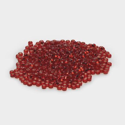 Beadsology pile of small translucent red Preciosa glass seed beads for embroidery and craft projects